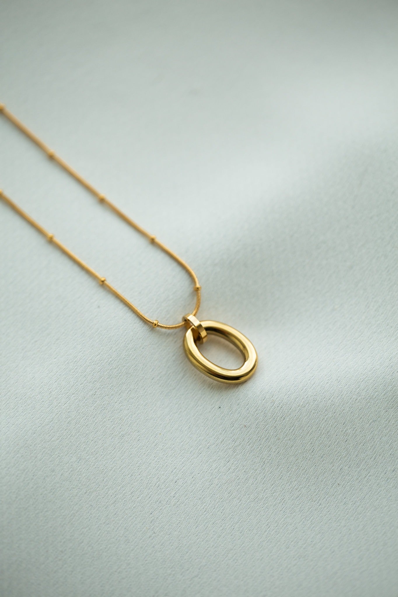 Omega 18K Pendant Necklace