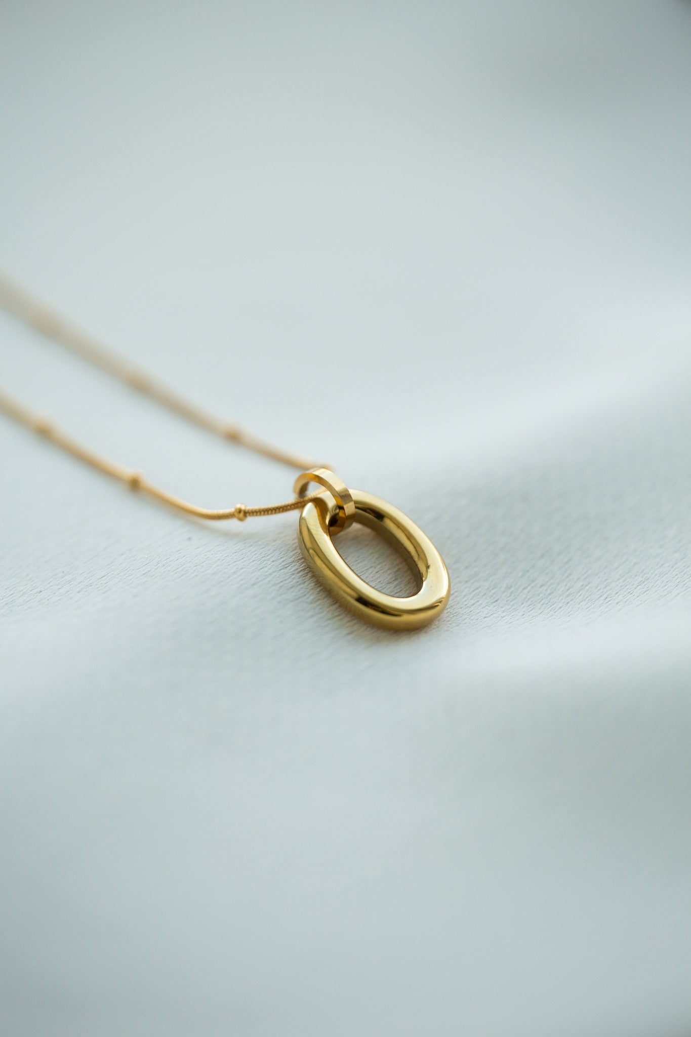 Omega 18K Pendant Necklace
