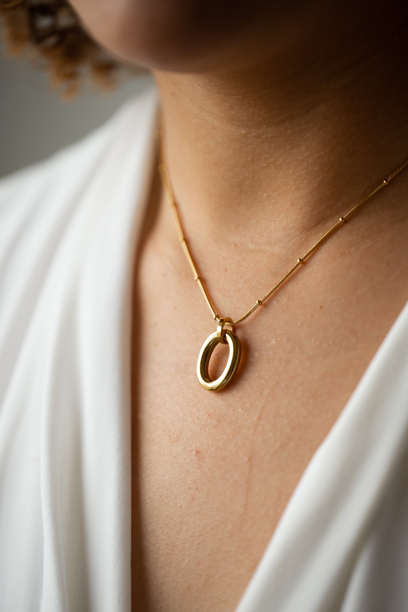 Omega 18K Pendant Necklace
